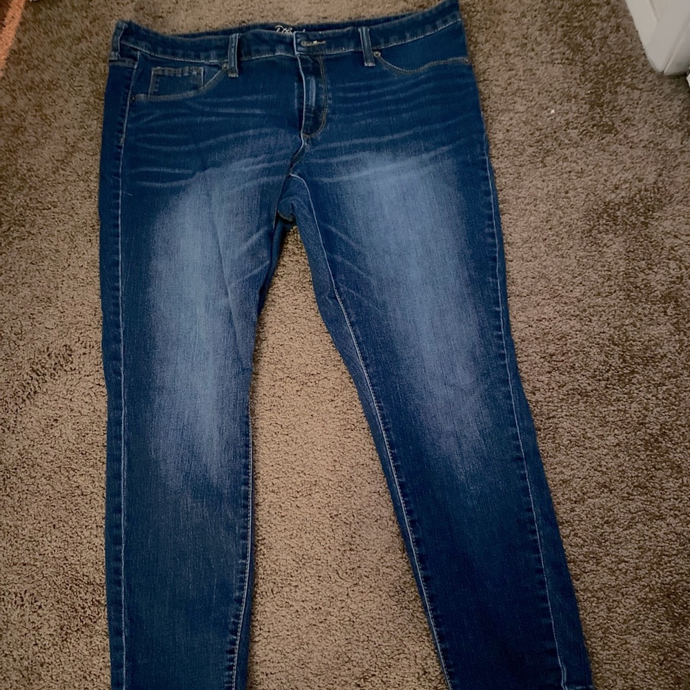Skinny jeans. Dark wash with faded thighs. High waist